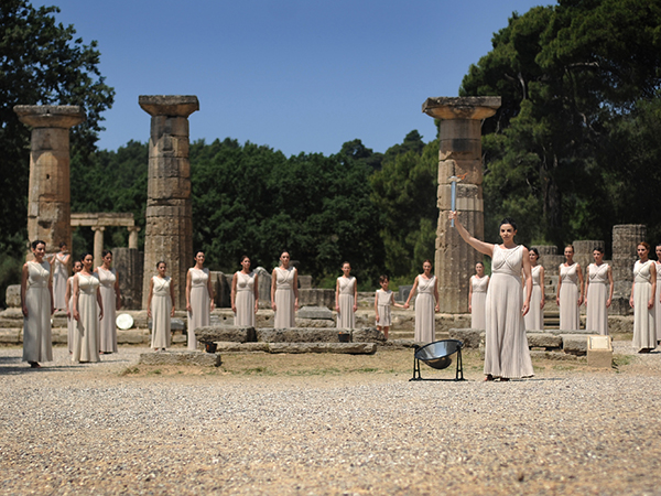 An actress dressed as the High Priestess holds the Olympic torch during the lighting ceremony at the Temple of Hera in Ancient Olympia, Greece. The ceremony organised by the Hellenic Olympic Committee (HOC) to light the Olympic Flame was held today inside the Temple of Hera at the historic ruins of the home of the ancient Olympic Games.